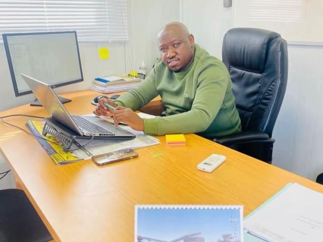 Founder at desk